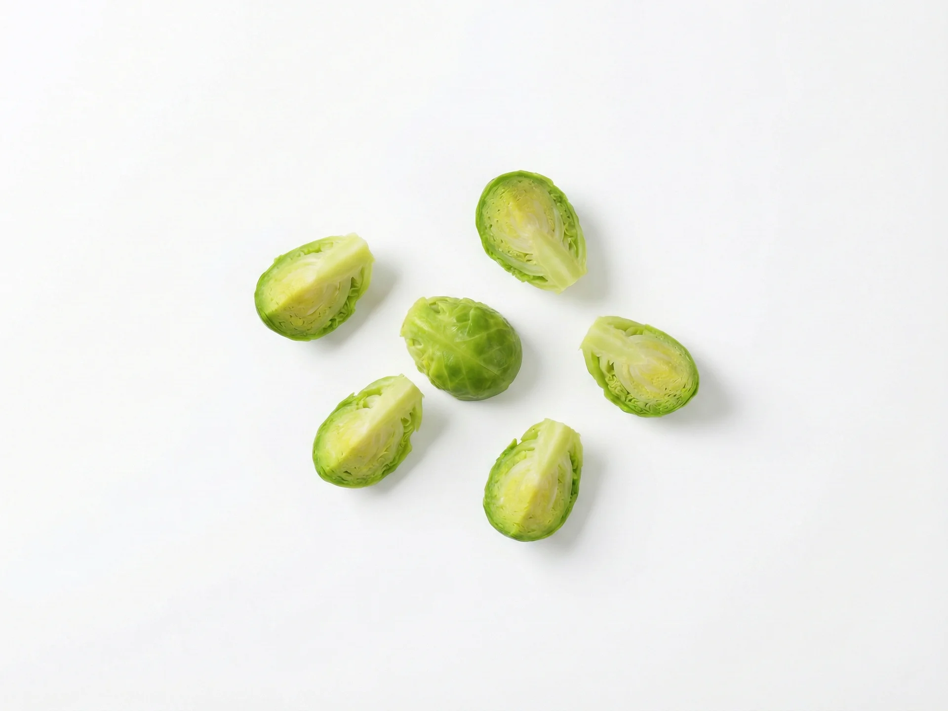 For babies 9-12 months, cook Brussels sprouts until soft but with a bit more texture. Cut them into small, pea-sized pieces or quarters to encourage self-feeding. You can lightly roast them with a touch of olive oil for added flavor, but avoid added salt.