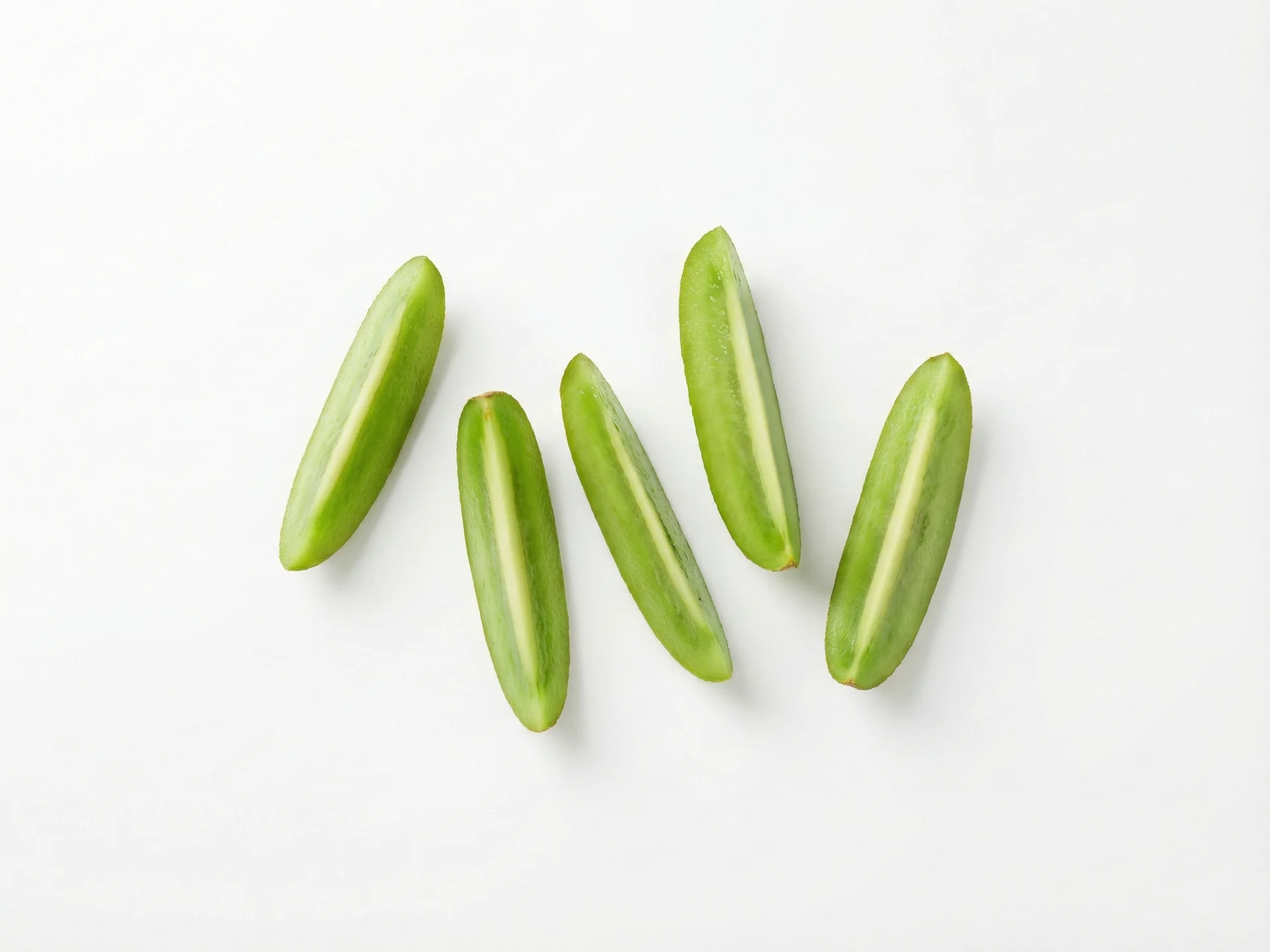 For babies 6-9 months, peel the kiwi completely and cut into large, graspable spears about the size of two adult fingers. The spears should be soft enough to mash between your fingers. You can also mash it lightly and pre-load onto a spoon for your baby to self-feed.