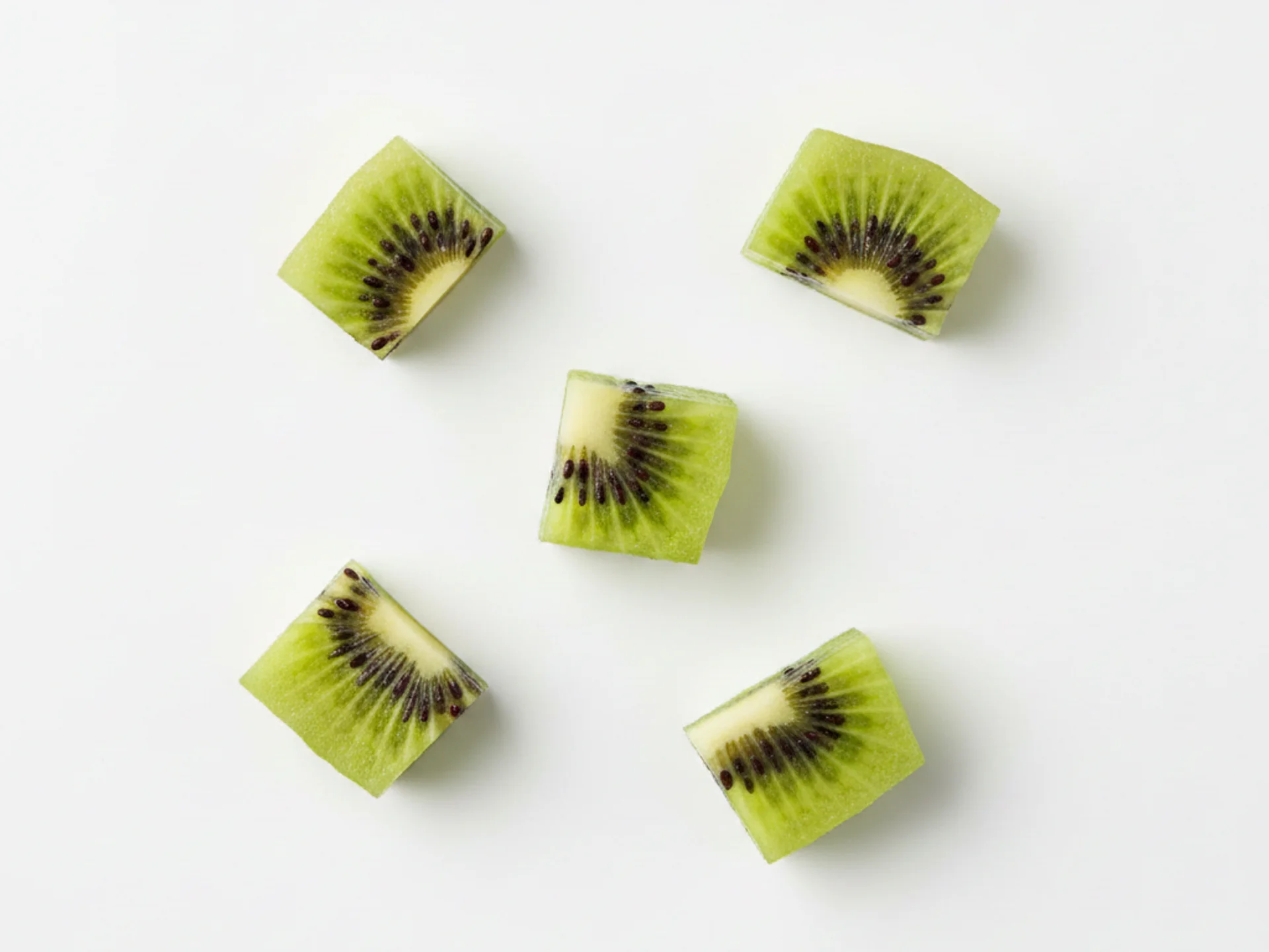 For babies 9-12 months, continue peeling the kiwi and cut into smaller, bite-sized pieces about the size of a pea. Your baby is developing their pincer grasp, so smaller pieces encourage this skill. You can also offer thin slices or wedges.