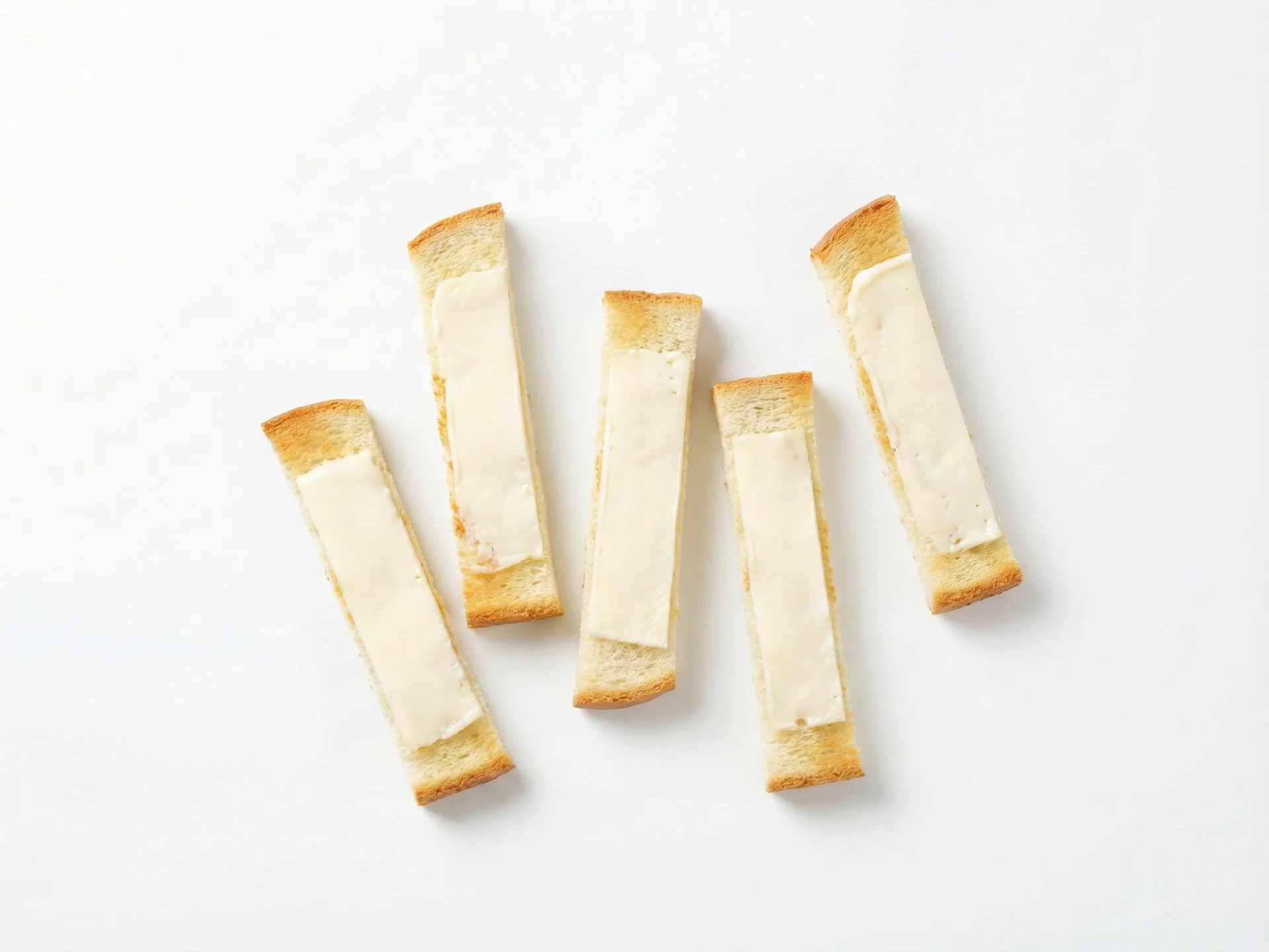For babies 12-18 months, spread a thin layer of Neufchâtel on lightly toasted bread strips or soft crackers. The toast should be firm enough to hold but soft enough to gum easily. You can also mix a small amount into mashed vegetables or spread on cucumber slices.