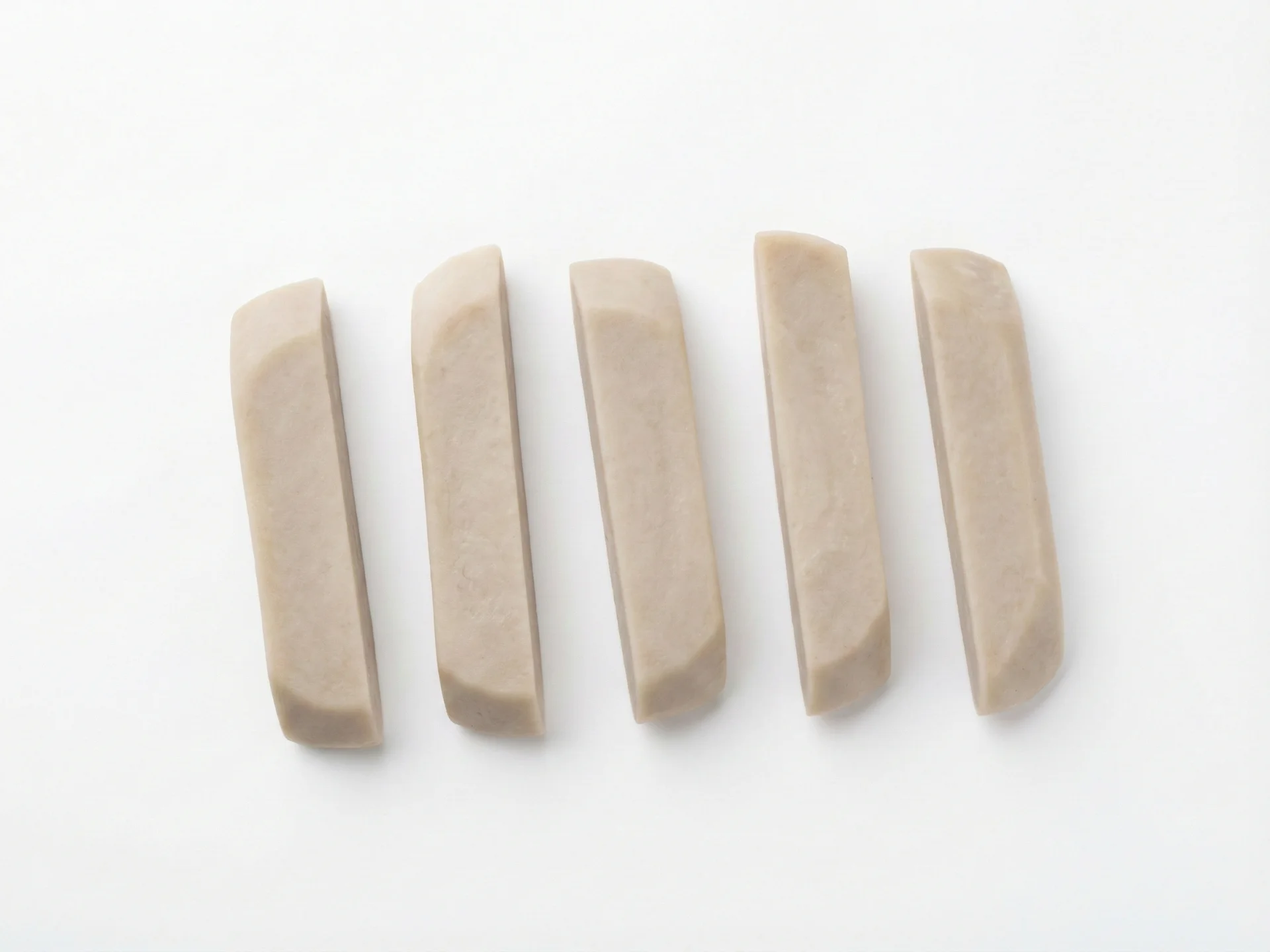 For babies 6-9 months, cook taro until very soft and mashable, then serve as thick, palm-sized sticks or large, flattened discs that are easy to hold. The texture should be smooth and gummable, with no hard bits. Avoid small pieces that could be swallowed whole.